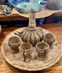 McCarty Pottery charger, wine glasses, and turkey server